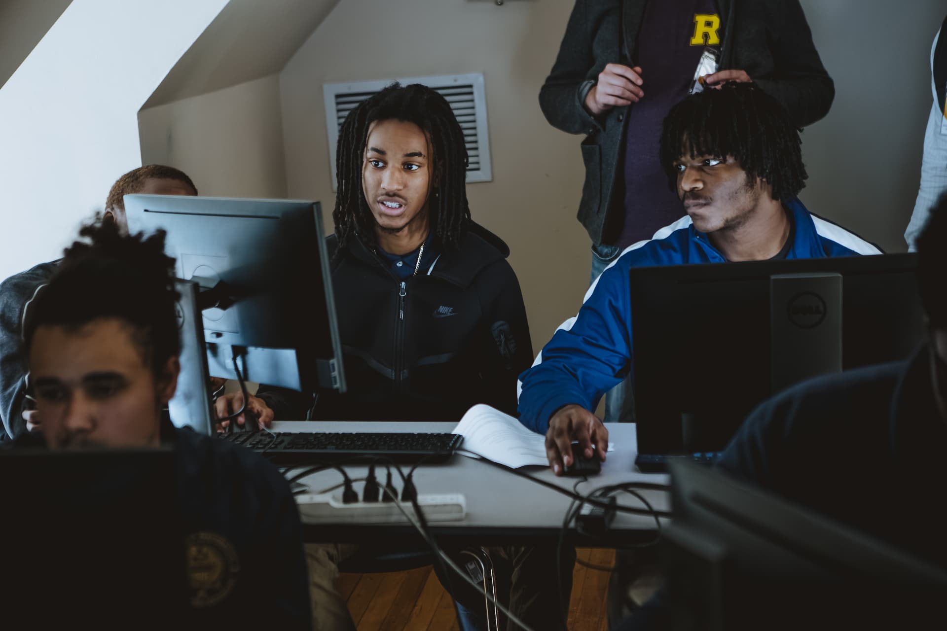 UPrep students working at computer monitors in a technology lab